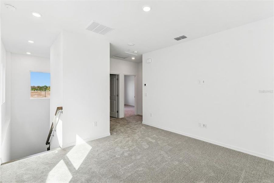 Spacious, unfurnished interior of a new home in Laureate Park at Lake Nona - Garden Series, Orlando (Image 20).