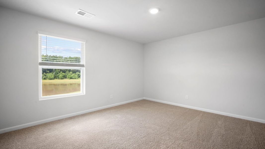 Spacious, unfurnished interior of a new home in The Lakes at North Glynn, Brunswick (Image 19).