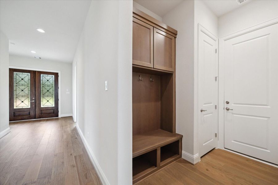 Mud Nook off of 4-Car Tandem Garage.