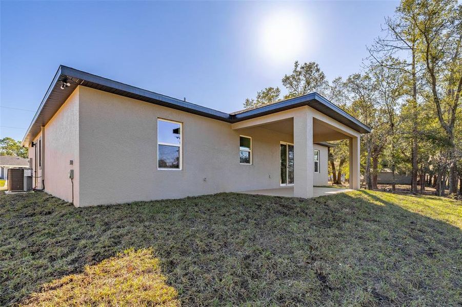 Exterior details and patio area of a home in , Avon Park (Image 21). Exterior details and patio area of a home in , Avon Park (Image 21).