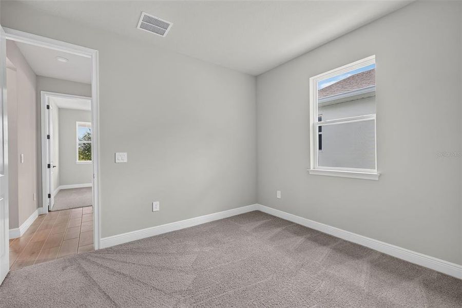 Spacious, unfurnished interior of a new home in Crosswind Ranch, Parrish (Image 31). Spacious, unfurnished interior of a new home in Crosswind Ranch, Parrish (Image 31).