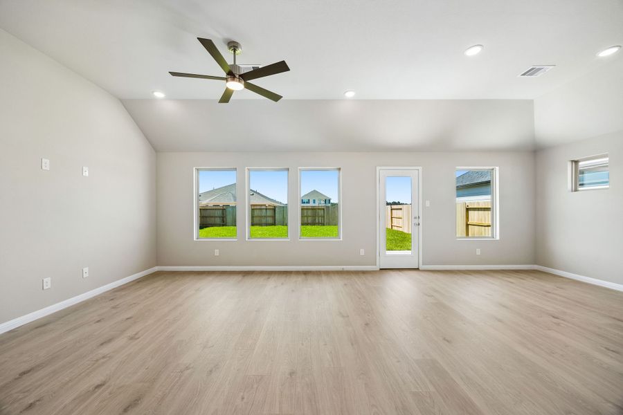 Living Room in the Sabine home plan by Trophy Signature Homes – REPRESENTATIVE PHOTO Living Room in the Sabine home plan by Trophy Signature Homes – REPRESENTATIVE PHOTO