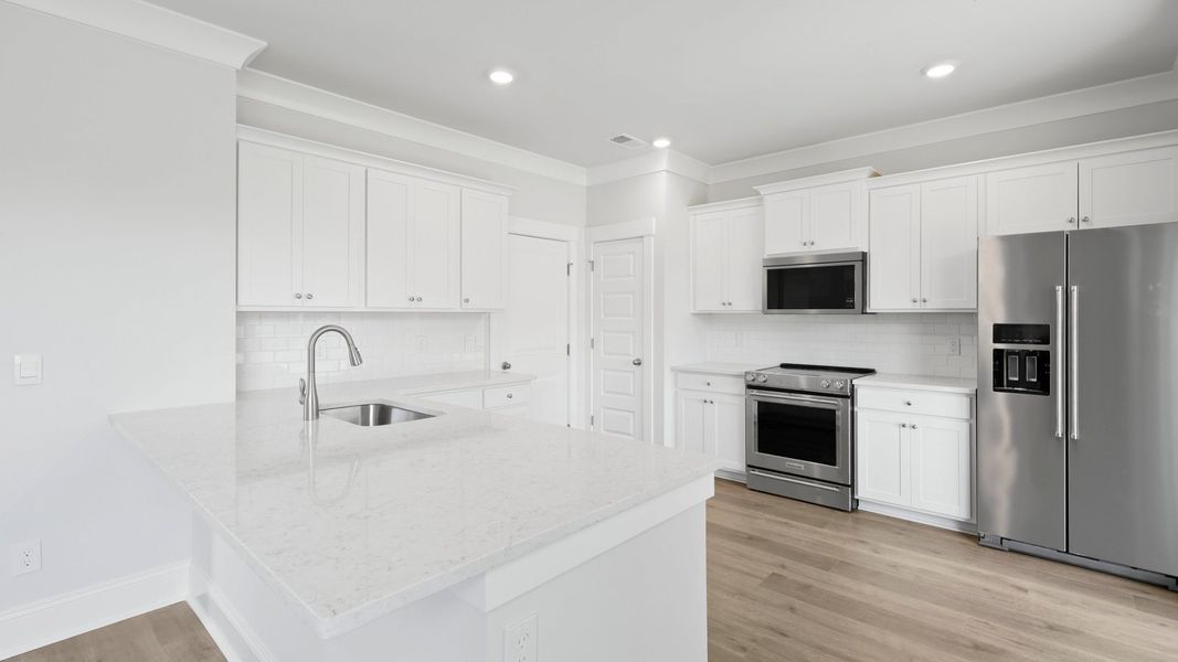 Representative furnished interior of a home built from the HARRIS by D.R. Horton in Sheep Island, Summerville (Image 4).