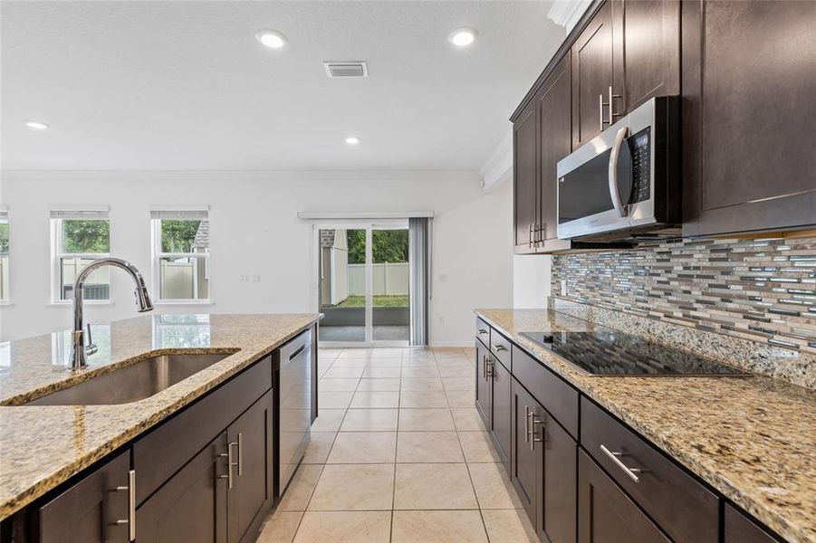 Furnished interior view inside a new home in Avalon Woods, Newberry (Image 11).