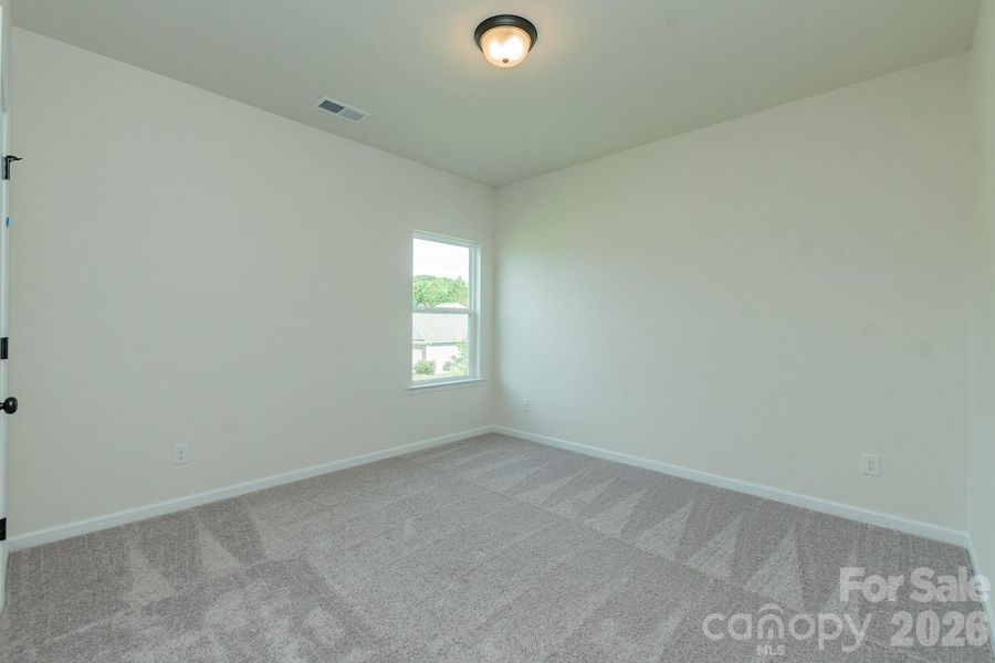 Spacious, unfurnished interior of a new home in Country Club Village, Salisbury (Image 30).