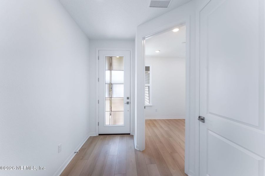 Spacious, unfurnished interior of a new home in Del Webb Wildlight, Yulee (Image 39).