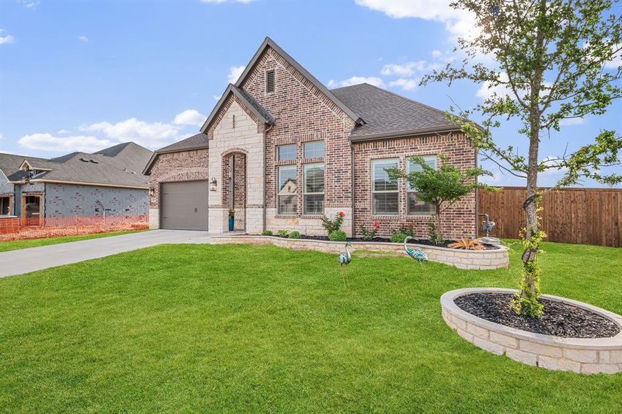 Front exterior of a new home in , Van Alstyne, TX, highlighting curb appeal (Image 21).