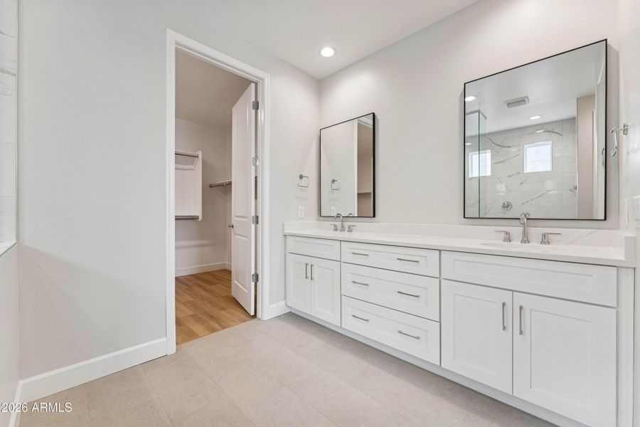 Primary Bath with framed mirrors Primary Bath with framed mirrors