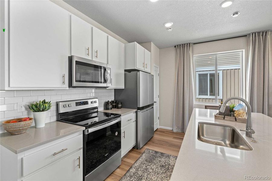 Furnished interior view inside a new home in , Aurora (Image 9).
