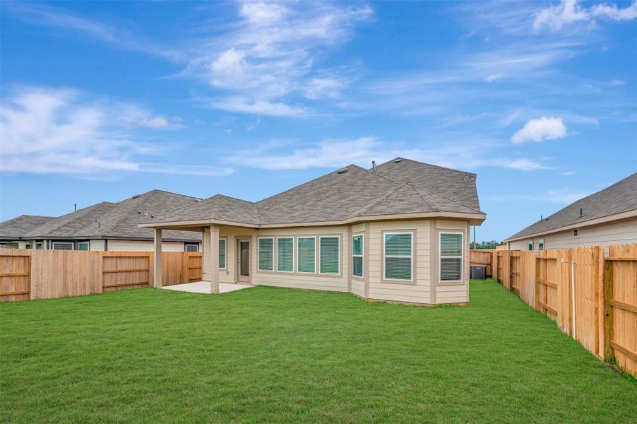 Exterior details and patio area of a home in Lone Star Landing, Montgomery (Image 26).