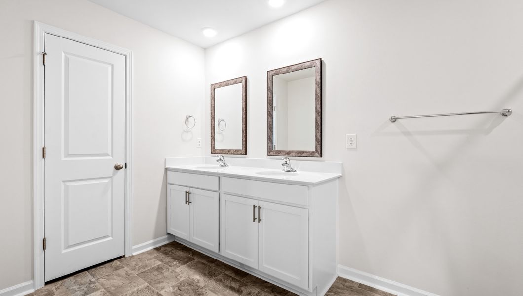 Representative furnished interior of a home built from the ELSTON by D.R. Horton in Harrier Point, Woodruff (Image 11).