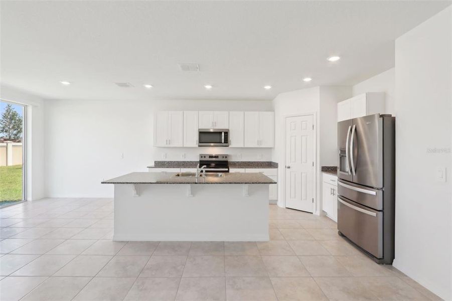 Furnished interior view inside a new home in Lawson Dunes - Signature Series, Haines City (Image 5). Furnished interior view inside a new home in Lawson Dunes - Signature Series, Haines City (Image 5).