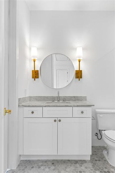 Bathroom with vanity and toilet