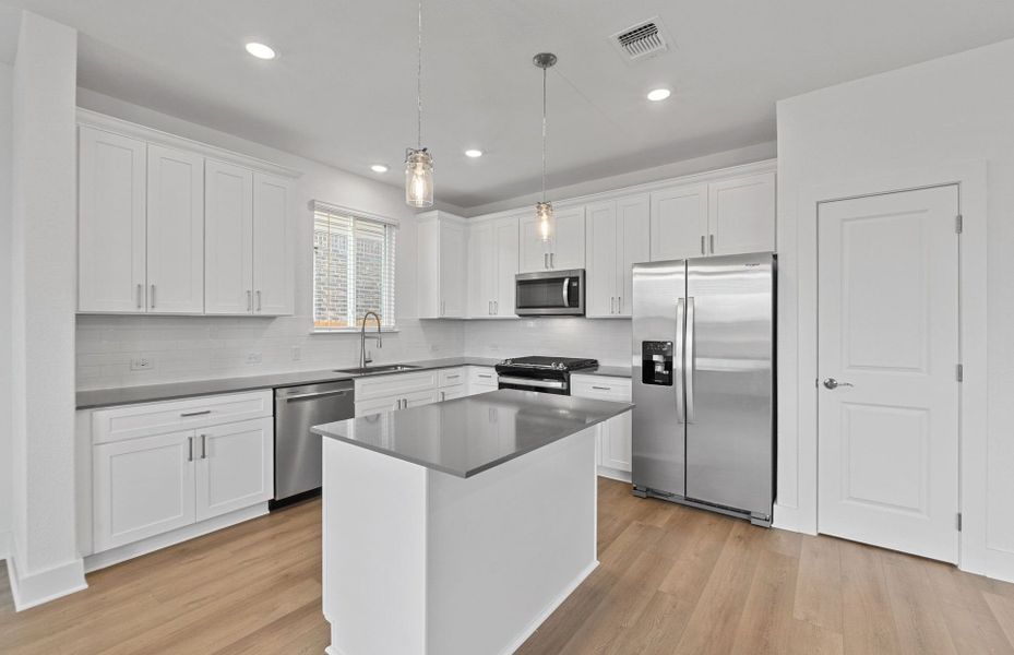 Furnished interior view inside a new home in Crosswinds, Kyle (Image 5).