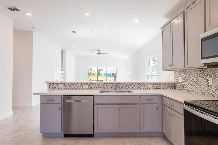Furnished interior view inside a new home in , Port Charlotte (Image 9).