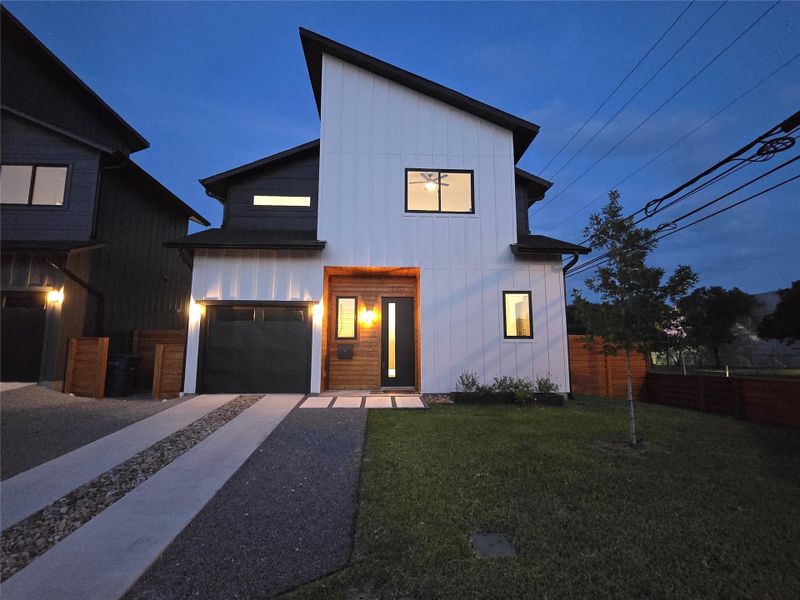 Exterior view of the front at dusk.