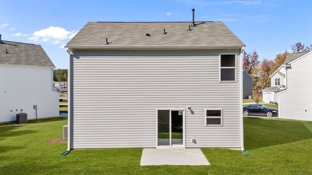 Exterior details and patio area of a home in Jetstream Park, Wilson (Image 19).