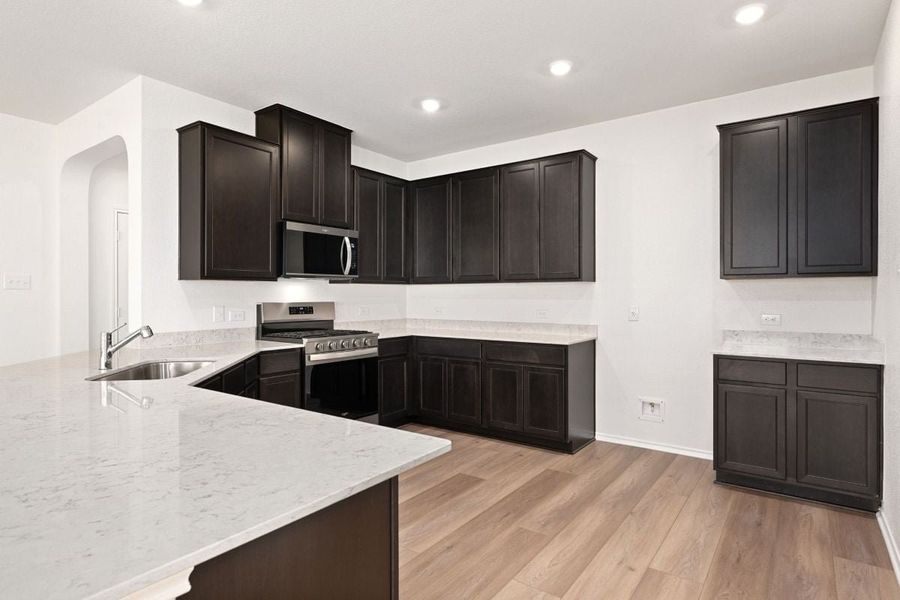 Furnished interior view inside a new home in River Bluff, Leander (Image 4).