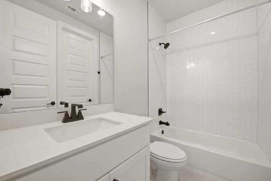 Furnished interior view inside a new home in Heritage, Dripping Springs (Image 12).