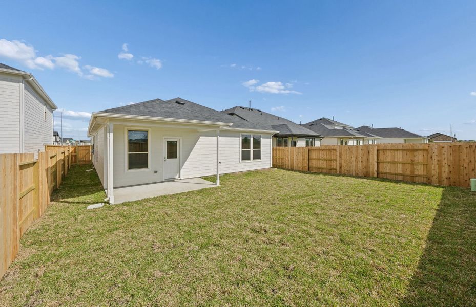 Exterior details and patio area of a home in Crosby Farms, Crosby (Image 4).