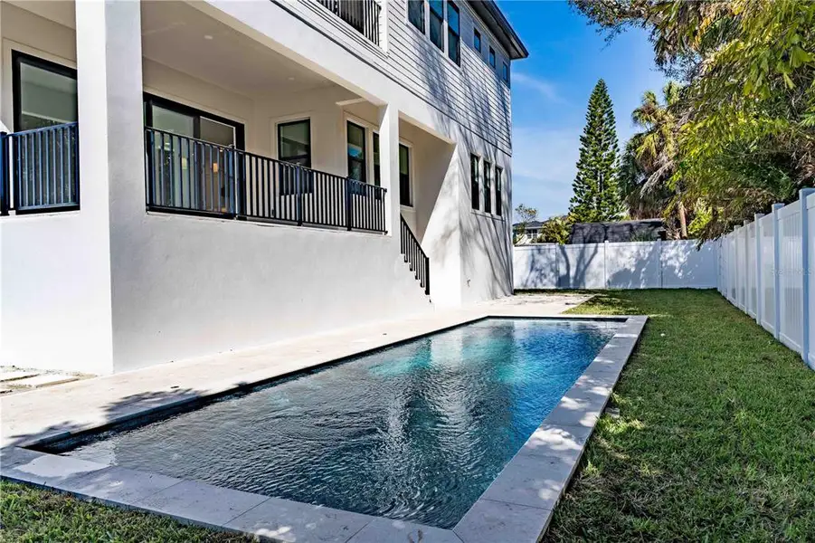 Exterior details and patio area of a home in City Homes - South Tampa, Tampa (Image 3).