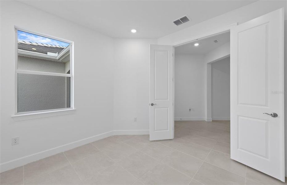 Spacious, unfurnished interior of a new home in BeachWalk by Manasota Key, Englewood (Image 18). Spacious, unfurnished interior of a new home in BeachWalk by Manasota Key, Englewood (Image 18).