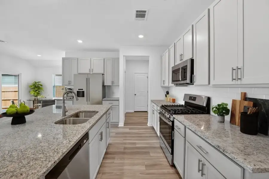 Furnished interior view inside a new home in Lisso, Pflugerville (Image 6).