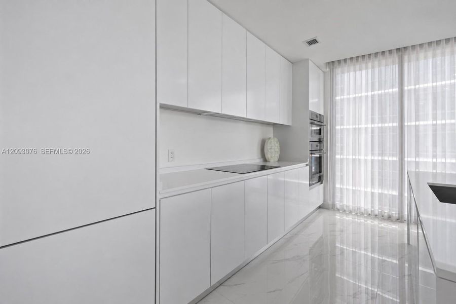 Furnished interior view inside a new home in Aria Reserve, Miami (Image 14).