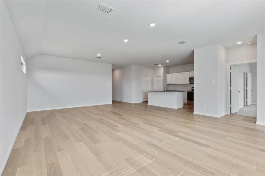 Open Floor Plan in the Hayden home plan by Trophy Signature Homes – REPRESENTATIVE PHOTO Open Floor Plan in the Hayden home plan by Trophy Signature Homes – REPRESENTATIVE PHOTO