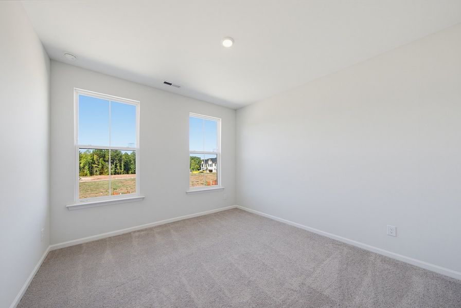 Spacious, unfurnished interior of a new home in Sweetbrier, Durham (Image 23).