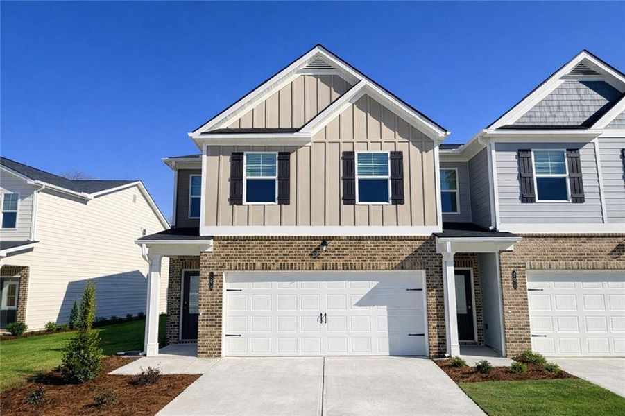 Front exterior of a new home in The Enclave at Whitewater Creek, Union City, GA, highlighting curb appeal (Image 1). Front exterior of a new home in The Enclave at Whitewater Creek, Union City, GA, highlighting curb appeal (Image 1).