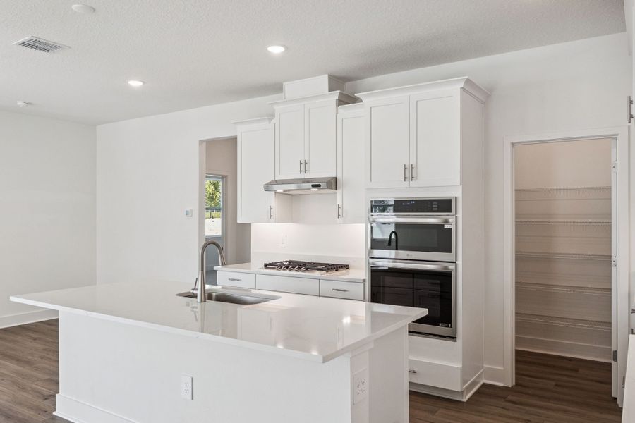 Representative furnished interior of a home built from the Aspen by Hartizen Homes in Eden Crest, Apopka (Image 8).