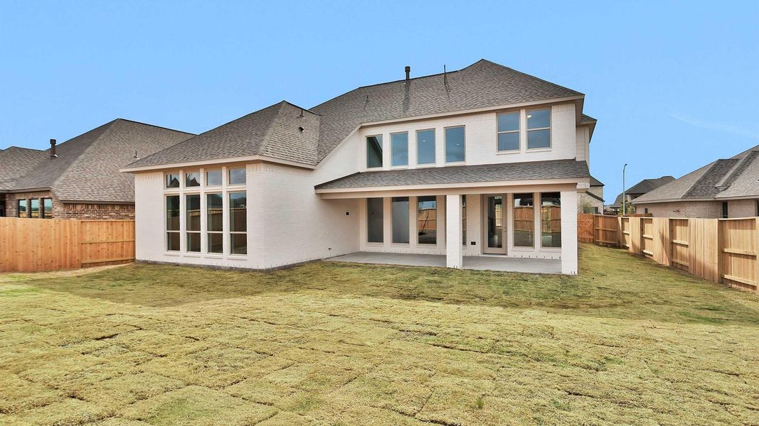 Exterior details and patio area of a home in Meridiana, Manvel (Image 4).