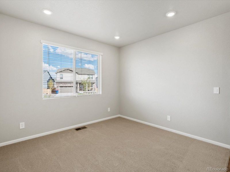 Spacious, unfurnished interior of a new home in Ridgeline Vista: The Flora Collection, Brighton (Image 27). Spacious, unfurnished interior of a new home in Ridgeline Vista: The Flora Collection, Brighton (Image 27).