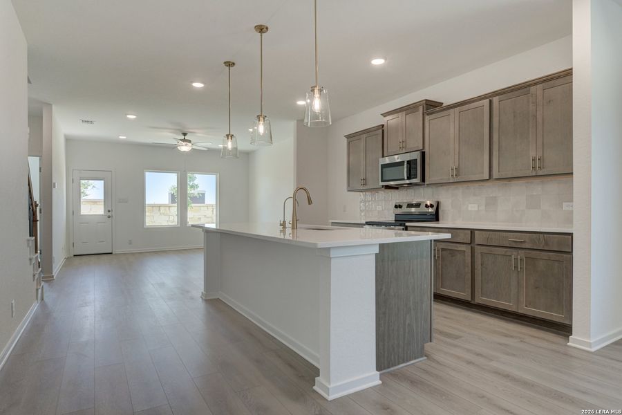 Furnished interior view inside a new home in Hennersby Hollow, San Antonio (Image 7).