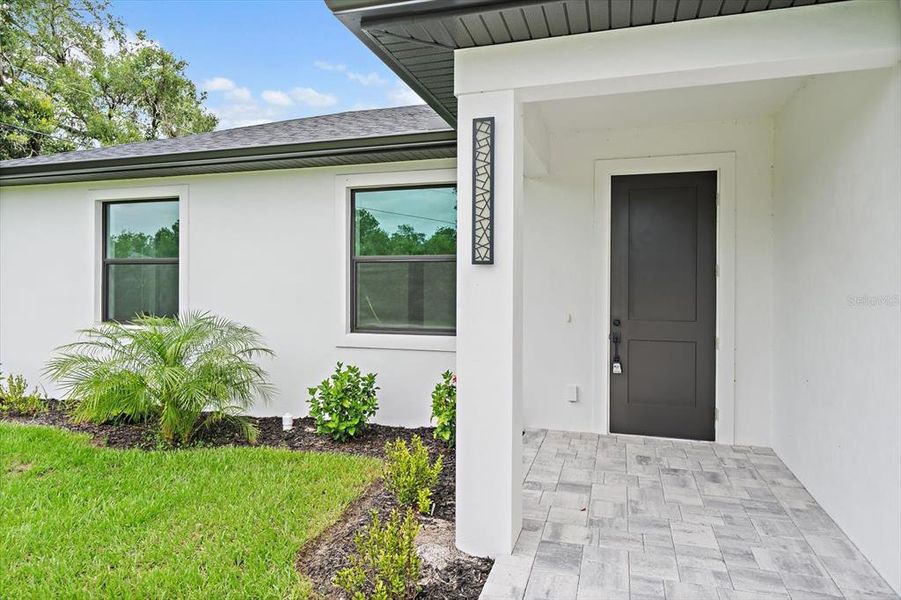 Exterior details and patio area of a home in , North Port (Image 4).