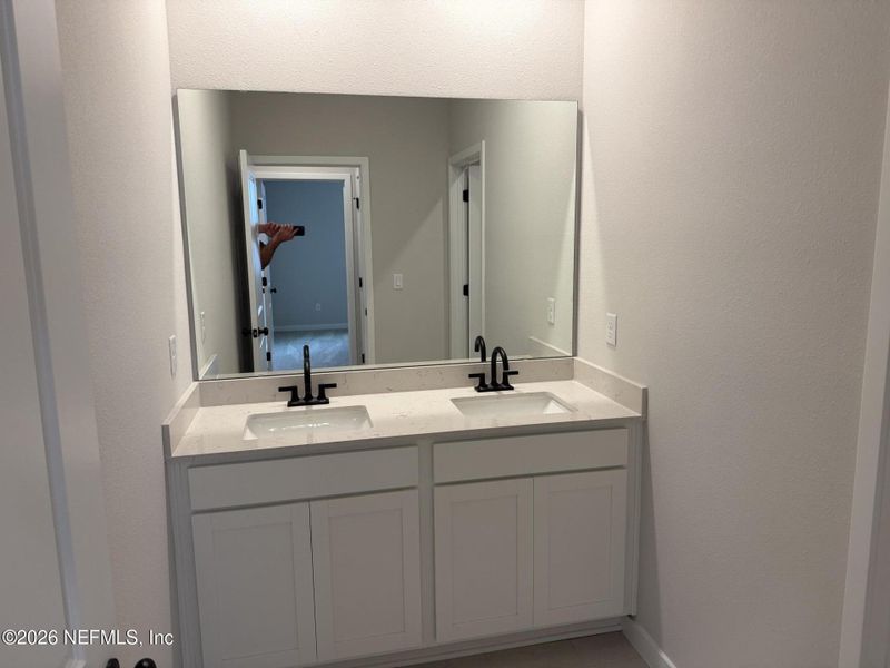 Furnished interior view inside a new home in Reserve East, Flagler Beach (Image 14).