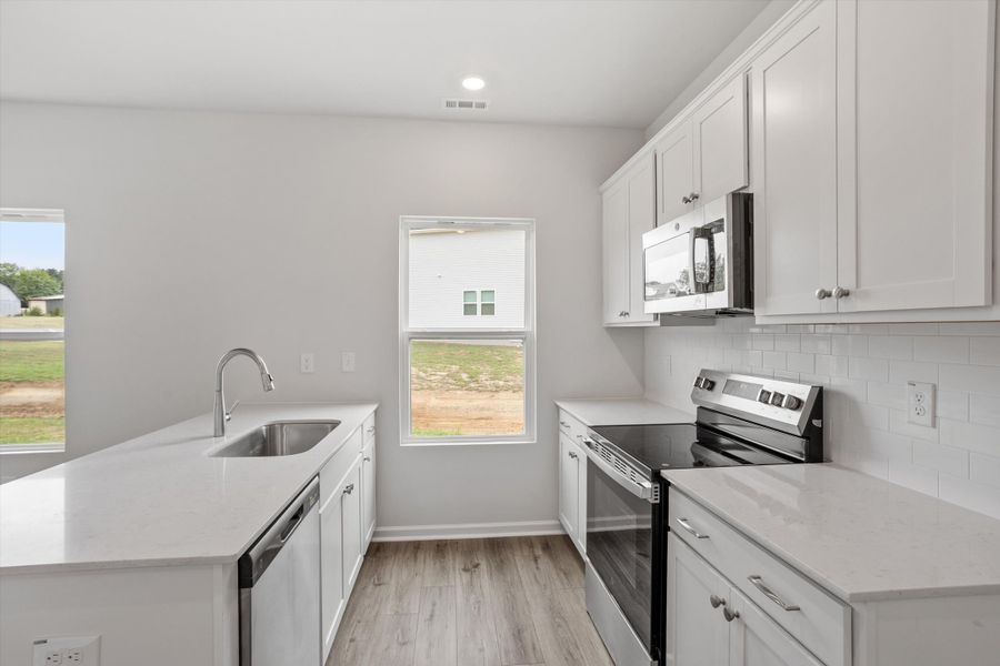 Furnished interior view inside a new home in Cambridge Reserve, Angier (Image 9).