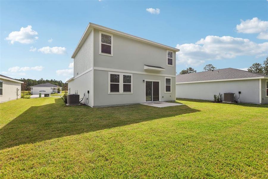 Exterior details and patio area of a home in Flagler Village - Classic Series, Palm Coast (Image 22). Exterior details and patio area of a home in Flagler Village - Classic Series, Palm Coast (Image 22).