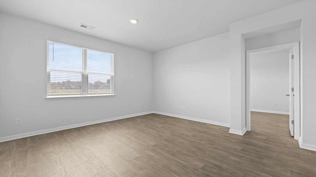 Spacious, unfurnished interior of a new home in The Ranch, Holly Hill (Image 21).