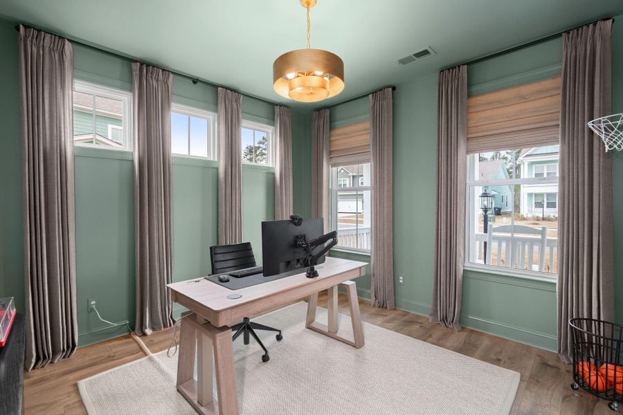 Furnished interior view inside a new home in Tidewater at Lakes of Cane Bay, Summerville (Image 19).