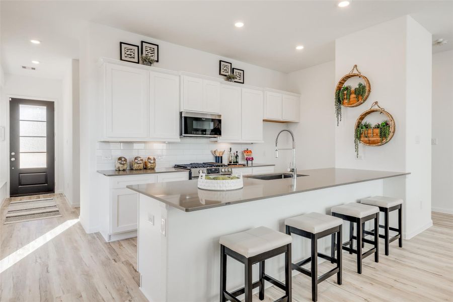 Furnished interior view inside a new home in Bridgeland, Cypress (Image 12).