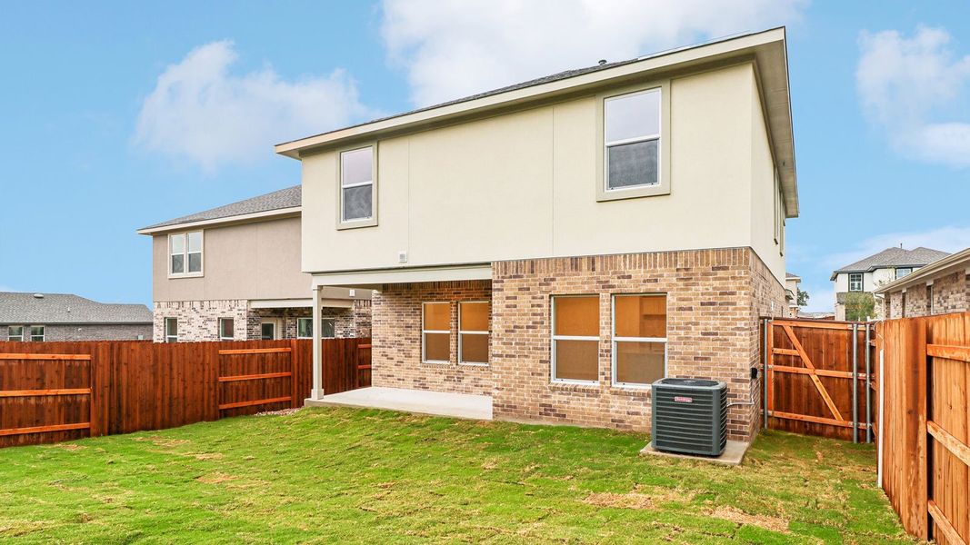 Exterior details and patio area of a home in Bar W Ranch, Leander (Image 22).