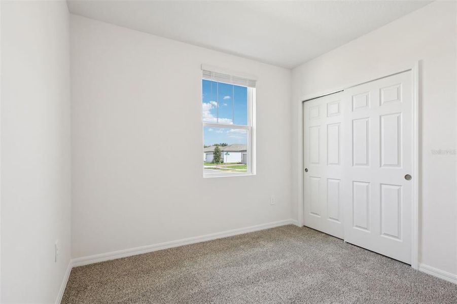 Spacious, unfurnished interior of a new home in Bradbury Creek - Signature Series, Haines City (Image 20).