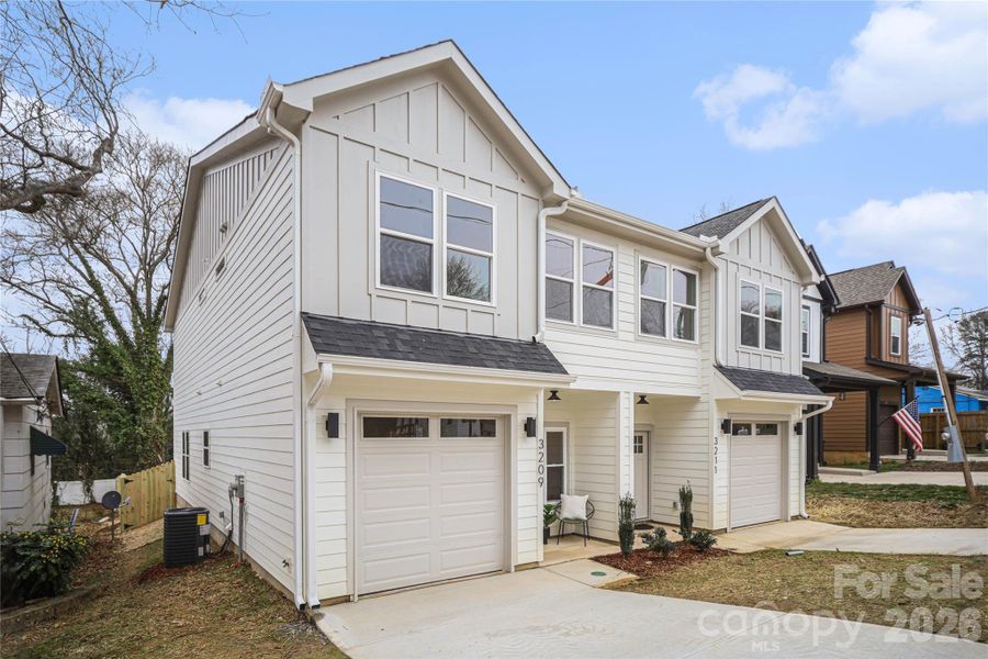 Front exterior of a new home in , Charlotte, NC, highlighting curb appeal (Image 22).