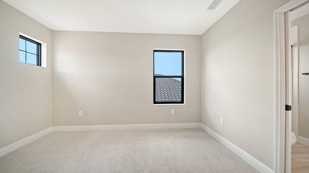 Spacious, unfurnished interior of a new home in Windward Real Estate and Homes for Sale in Sarasota, FL - Neal Communities, Lakewood Ranch (Image 51).