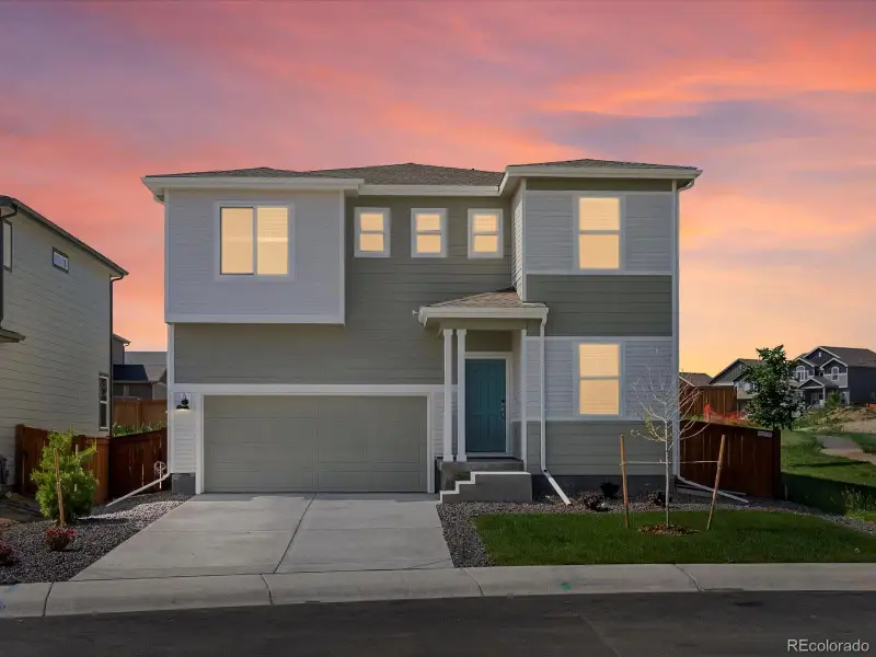 Front exterior of a new home in Hidden Valley Farm, Severance, CO, highlighting curb appeal (Image 1).