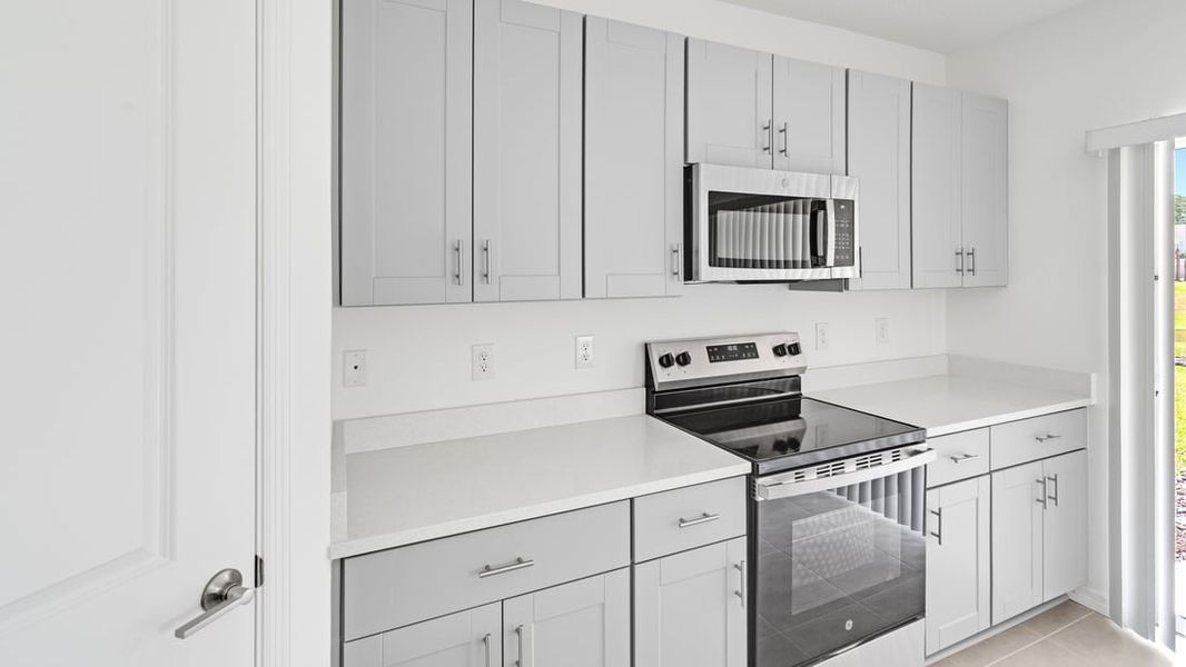 Representative furnished interior of a home built from the Ambrosia by Taylor Morrison in Aden South at Westview, Kissimmee (Image 6).