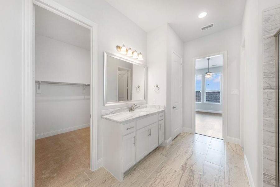 Representative furnished interior of a home built from the Colorado Executive by UnionMain Homes in Wildflower Ranch, Justin (Image 10).