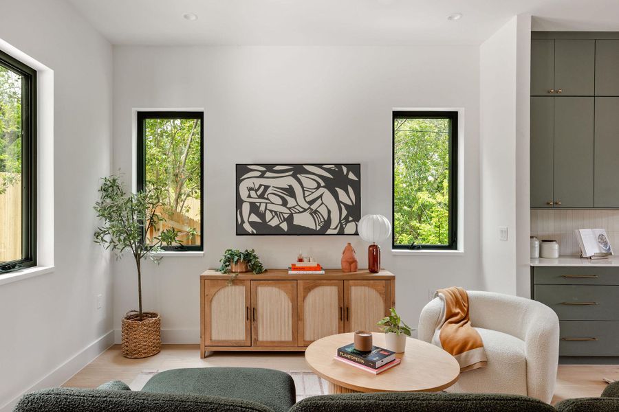 Dining space featuring healthy amount of natural light, light wood-style flooring, and recessed lighting Dining space featuring healthy amount of natural light, light wood-style flooring, and recessed lighting